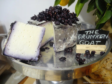 Another celebration of cheesemaker and winemaker. The Drunken Goat is a semi hard goat cheese that has been matured in red wine grape must from Coriole Vineyards.  Must def: The unfermented juice of grapes extracted by crushing or pressing